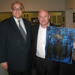 Former Astronaut Mark Kelly, husband of Gabrielle Giffords, acquiring one of Leving's paintings. 